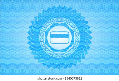 credit card icon inside sky blue water wave badge.