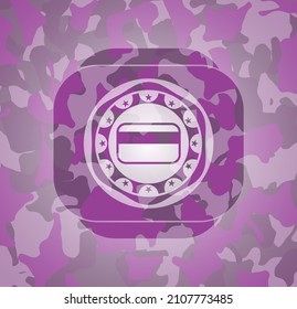 credit card icon on pink and purple camouflaged pattern. 