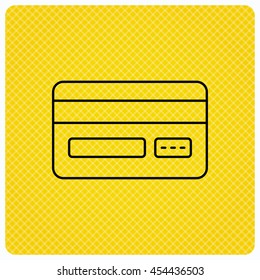 Credit card icon. Shopping sign. Linear icon on orange background. Vector