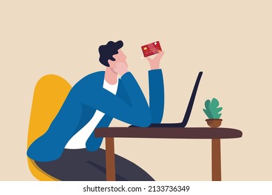 Credit card online payment, e-commerce or internet shopping concept, contemplation man looking at his credit card about to using it to buy things online.