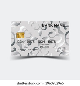 Credit card. With silver elements design. And inspiration from abstract. On white background. Glossy plastic style. 