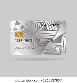 Tarjeta de crédito. Con diseño de elementos plateados. E inspiración de lo abstracto. Sobre fondo blanco. Estilo plástico brillante. 