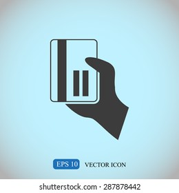 credit card vector icon in hand