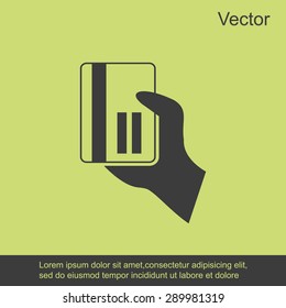 credit card vector icon in hand 