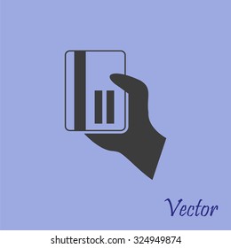 credit card vector icon in hand