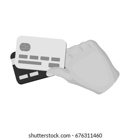 Credit cards in hand. E-commerce single icon in monochrome style vector symbol stock illustration web.