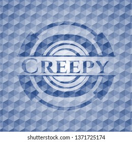 Creepy blue emblem with geometric pattern.