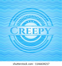Creepy light blue water style badge.