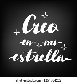 Creo en mi estrella, vector hand lettering. Translation from Spanish of phrase believe in my star. Chalkboard blackboard lettering writing, handwritten text, chalk on a blackboard, vector illustration