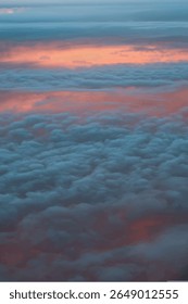 Crescent Moon in Dramatic Sunset Sky with Fiery Clouds. A crescent moon shines above glowing orange and pink clouds at sunset. A dramatic and peaceful sky, perfect for nature, spirituality, landscapes