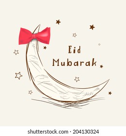Crescent moon with red bow on abstract brown background for Muslim community festival Eid Mubarak celebrations. 