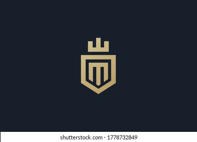 Crest M logo design , abstract letter M in the shield logo .