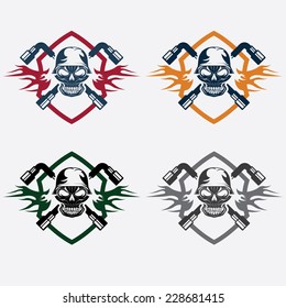 crest with skull in helmet and spanners