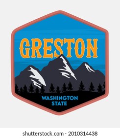 Creston with a view of the mountains and silhouettes of trees