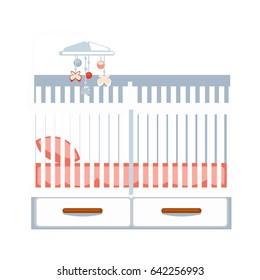 Crib with drawers and hanging rattle isolated on white