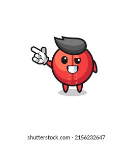 cricket ball mascot pointing top left , cute design