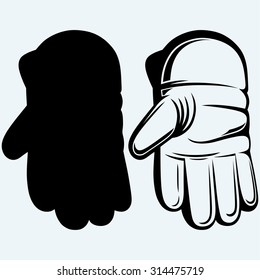 Cricket ball in a wicket keeping glove. Isolated on blue background