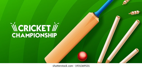 Cricket championship league concept with cricket bat, glossy ball and stumps for poster or banner on cricket field background