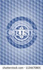 Crisis blue badge with geometric pattern.