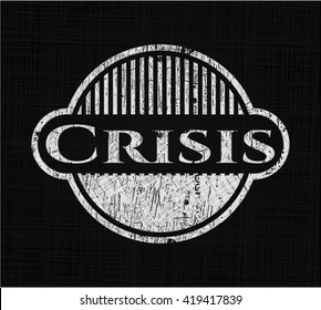 Crisis chalk emblem written on a blackboard