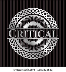 Critical silver emblem or badge