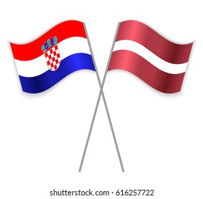 Croatian and Latvian crossed flags. Croatia combined with Latvia isolated on white. Language learning, international business or travel concept.