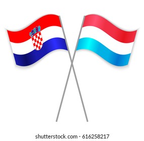 Croatian and Luxembourgish crossed flags. Croatia combined with Luxembourg isolated on white. Language learning, international business or travel concept.