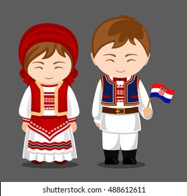 Croats in national dress with a flag. Man and woman in traditional costume. Travel to Croatia. People. Vector flat illustration.