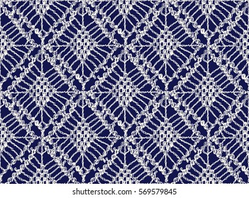 Crochet seamless pattern. Knitted or woven macrame in the bohemian style. Oriental motifs. Knitting mesh