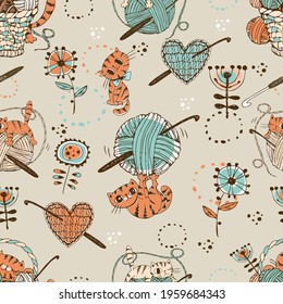 Crocheting. Seamless pattern with cute cats with balls of wool and knitting accessories. Vector.