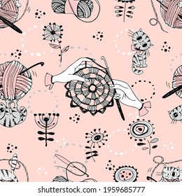 Crocheting. Seamless pattern with cute cats with balls of wool and knitting accessories. Vector