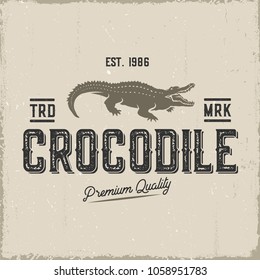 Crocodile retro label isolated on kraft paper.Vector illustration.