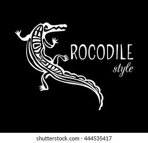 Crocodile Style logo. Outline alligator icon. White animal silhouette isolated on black background. Abstract design element. Vector illustration