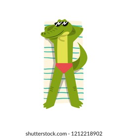 Crocodile sunbathing on the beach, cute animal cartoon character relaxing on the seashore at summer vacation vector Illustration on a white background