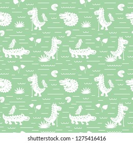 Crocodiles seamless pattern in green and white colors. Vector cartoon illustration for kids
