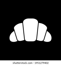 Croissant dark mode glyph icon. Baked food. French pastry. Bakery product. Culinary and cookery. Homemade food. White silhouette symbol on black space. Vector isolated illustration