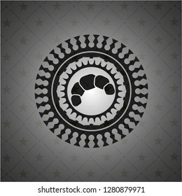 croissant icon inside black emblem
