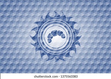 croissant icon inside blue emblem or badge with abstract geometric polygonal pattern background.