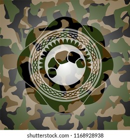 croissant icon inside camouflage emblem