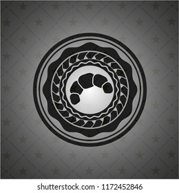 croissant icon inside dark badge or emblem