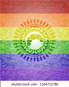 croissant icon inside emblem on mosaic background with the colors of the LGBT flag
