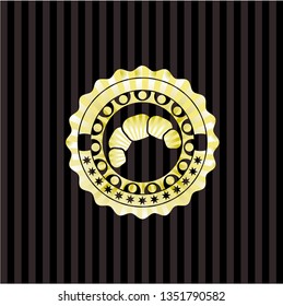 croissant icon inside gold shiny emblem