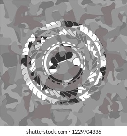 croissant icon inside grey camo texture