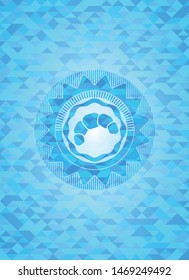 croissant icon inside light blue mosaic emblem