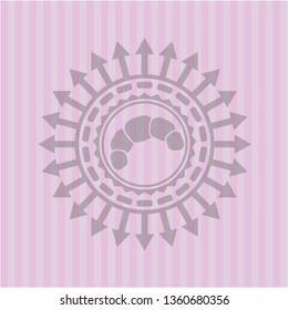 croissant icon inside pink emblem