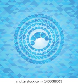 croissant icon inside realistic sky blue mosaic emblem