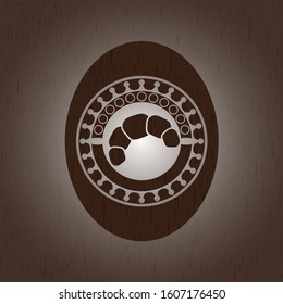 croissant icon inside realistic wooden emblem