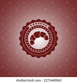 croissant icon inside retro red emblem