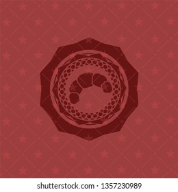 croissant icon inside retro red emblem
