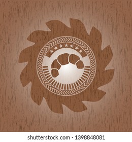 croissant icon inside retro wood emblem